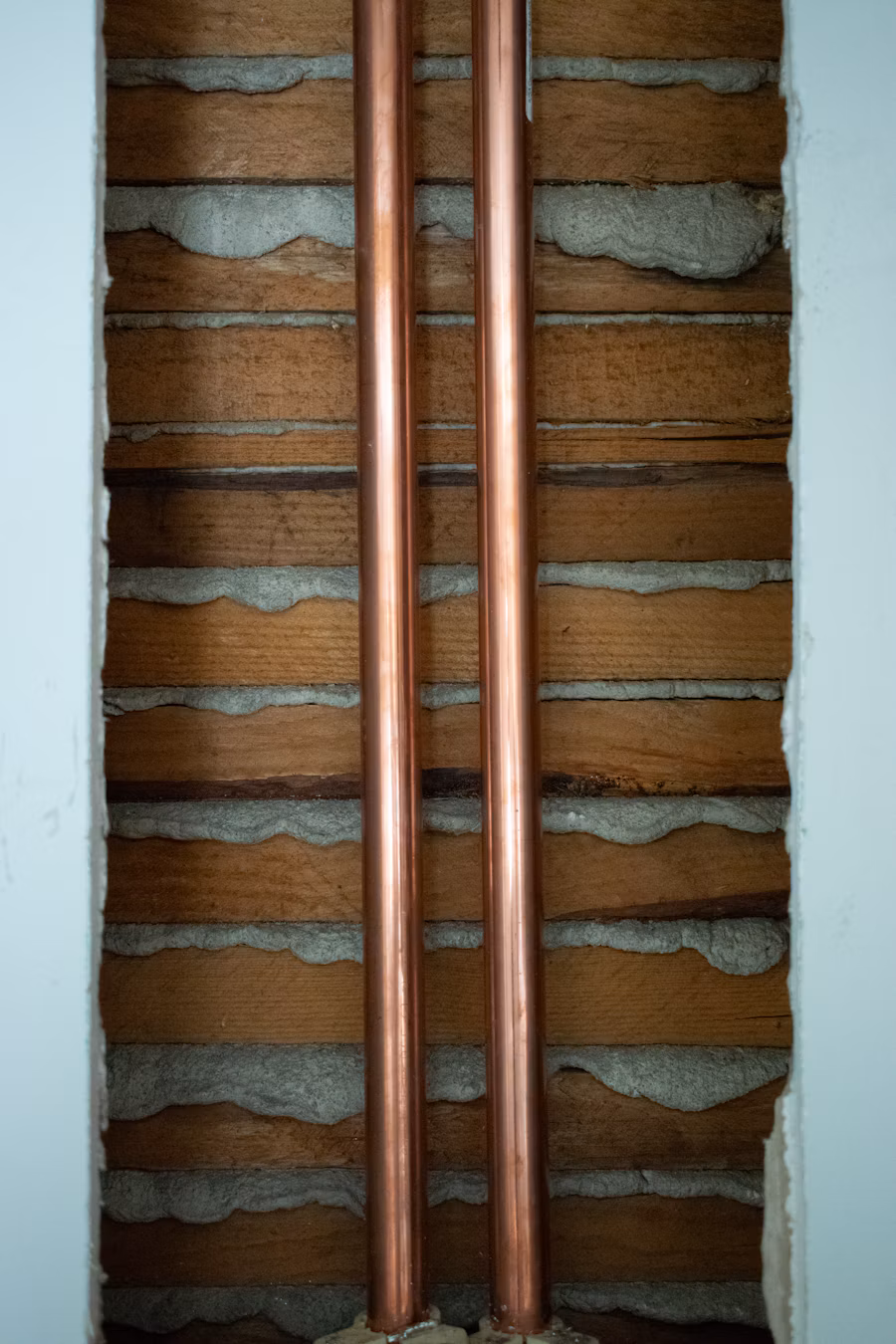 Copper pipes exposed during a repair